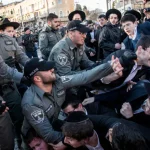 Haredi extremists block road to protest honoring of haredi soldiers in Jerusalem