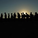 On the conservative divide over refugee resettlement, where will Trump fall?