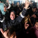 Gazans celebrate cease-fire deal, Hamas terrorists join crowd