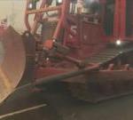 Fire department bulldozer heads down Sunset Boulevard