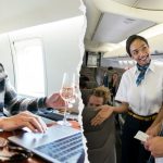 First-class pretenders cheat their way to free drinks by using ‘seat-squatter’ hack