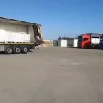 Watch: Dozens of aid trucks wait to enter Gaza