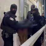 Watch: Arab who allegedly spat on IDF officer transferred to security prison