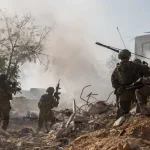 Officer shot by fellow soldiers after being identified as terrorist