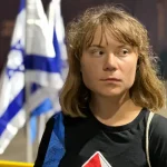 Flotilla ship arrives at Ashdod Port, Greta Thunberg photographed near Israeli flag