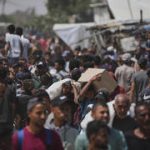 Gaza aid suspended after Hamas threatens workers, relief organization says