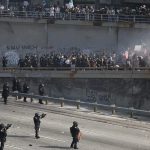 2,000 LA anti-ICE rioters takeover 101 Freeway downtown as self-driving cars lit on fire in chaotic scene