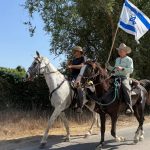 ‘We can save the next family from the worst’: Former hostages rally on horseback at Nir Oz