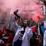 UK police arrest more than 50 at protest for banned Palestine Action group