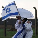 ‘Attempt to reshape historical narrative’: IDF delegation at Auschwitz told to lower Israeli flags