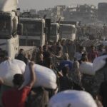 100+ NGOs accuse Israel of blocking Gaza aid; military liaison: Groups refused terror vetting