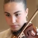 Watch: Captivity survivor Agam Berger plays ‘Hatikva’ at Berlin Jewish festival