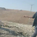 Injured resident documents terrorist throwing stone