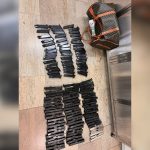 Israel Police confiscate over 100 pistols, thwart smuggling attempt at Ben-Gurion Airport