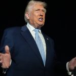 Trump defends Tucker Carlson after interview with antisemitic activist Nick Fuentes