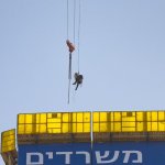 Fire Teams Rescue 15-Year-Old Stuck on Crane Over High-Rise Building in Jerusalem