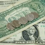 US dollar slides after Fed cuts rates, as expected