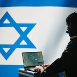 Mossad spurs Iran protests, says agents with demonstrators in Farsi message