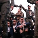 Haredim block traffic on Route 4 in protest of arrests of draft-dodgers