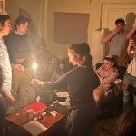 Brown University students light first Hanukkah candle in the shadow of mass shooting