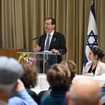 President Herzog calls for state commission, rejects political panel on Oct. 7