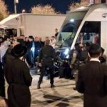 Dozens of Haredi youth block Jerusalem light rail over draft arrest