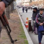 Tens of thousands flee Aleppo as Syrian army, Kurdish clashes escalate