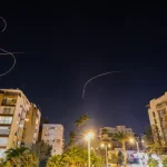 Sirens across Israel following Iranian launches, woman moderately injured in Rishon LeZion