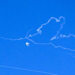 Hezbollah rocket fire triggers sirens in Tel Aviv, impacts reported in open areas without injuries