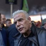 Lapid slams government for advancing controversial legislation during wartime, harming unity
