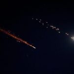 Woman injured from flying debris in central Israel as Iran keeps up missile fire