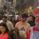 Flouting wartime restrictions, revelers party in Jerusalem streets for Purim’s final hours