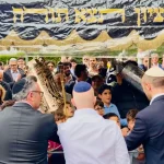 A scroll, a street, and a promise