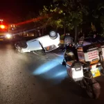 Man survives car crash – and is killed by police car