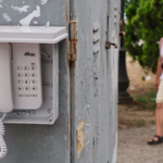 As war disrupts mobile networks, pay phones return to Crimea